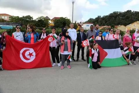 عين دراهم..تظاهرة أكتوبر الوردي بألوان فلسطينية