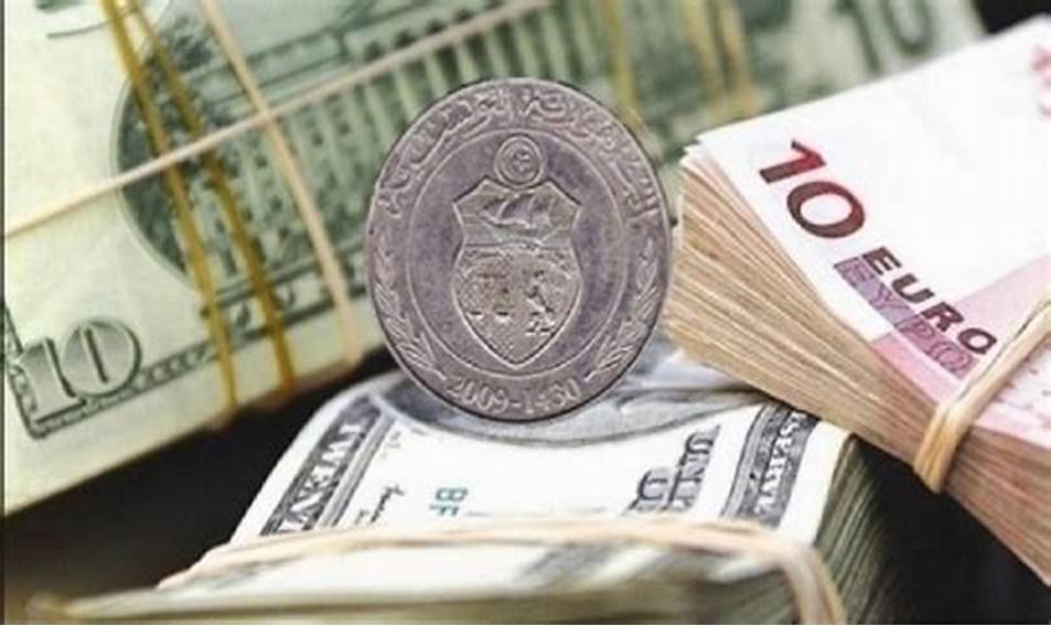 انتعاشة طفيفة للدينار التونسي أمام الدولار تفتح آفاقا واعدة للاقتصاد
