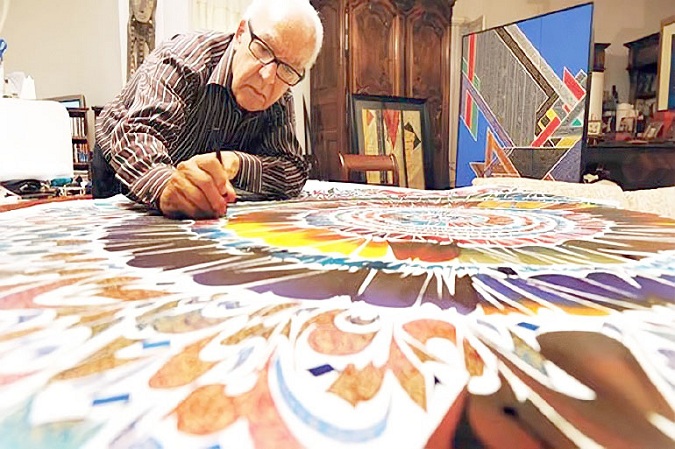 وقع معلّقة الدورة الجديدة لمعرض تونس الدولي..   نجا المهداوي «خطاط الحروف الراقصة» وسفير الحداثة البصرية التونسية